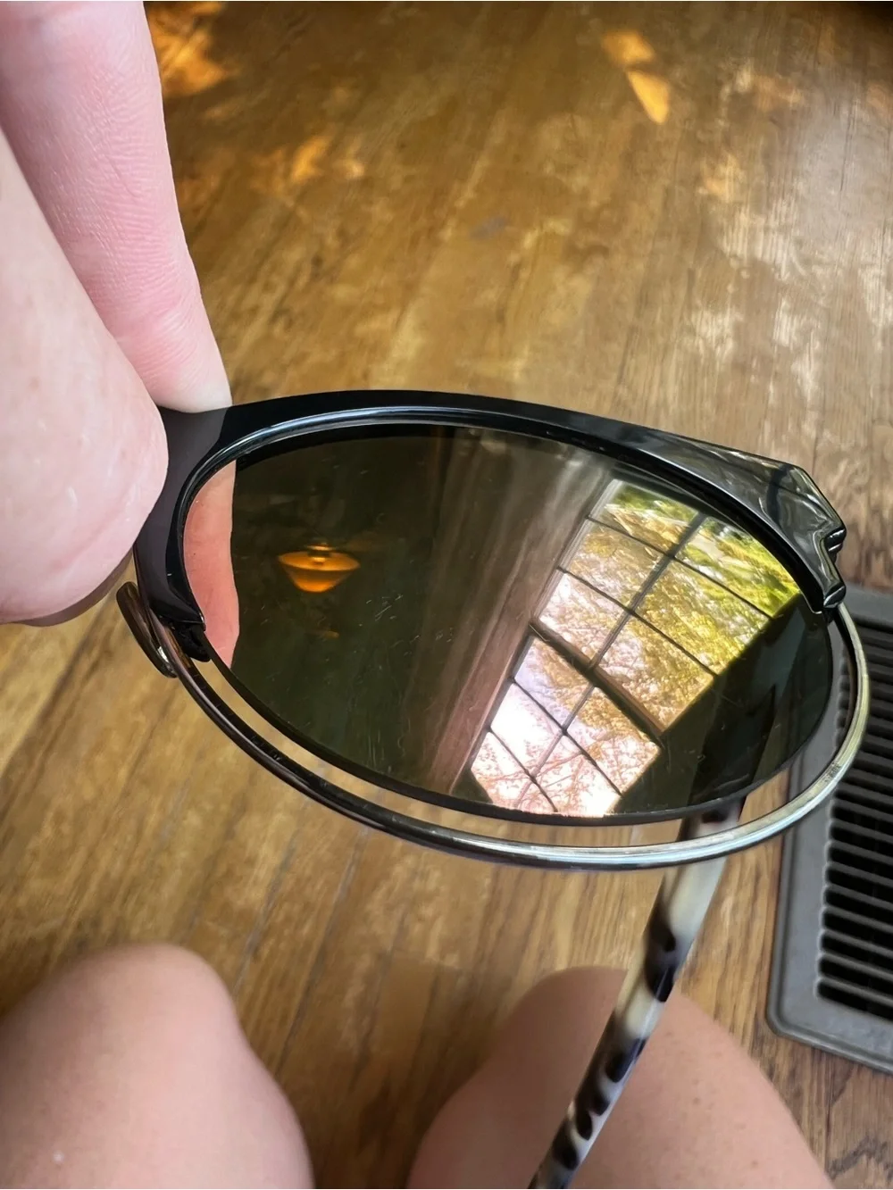 Dior Women's Black Frame Sunglasses with Pink Mirror Lenses